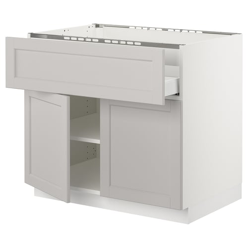 New white SEKTION kitchen unit with adjustable shelves and bevelled edges. Modern, clean design with a traditional look.