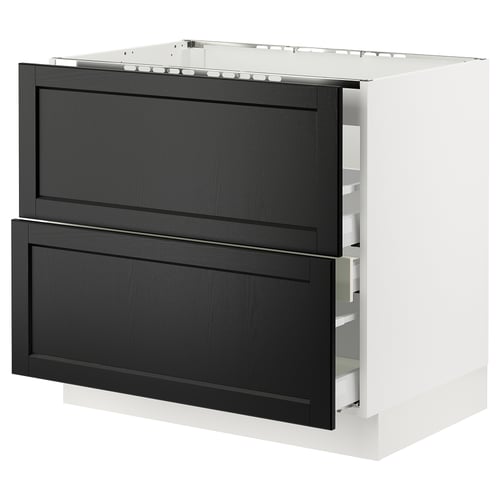 Modern kitchen cabinet with black-stained wood drawers and white frame, featuring bevelled drawer edges and sleek, functional design.
