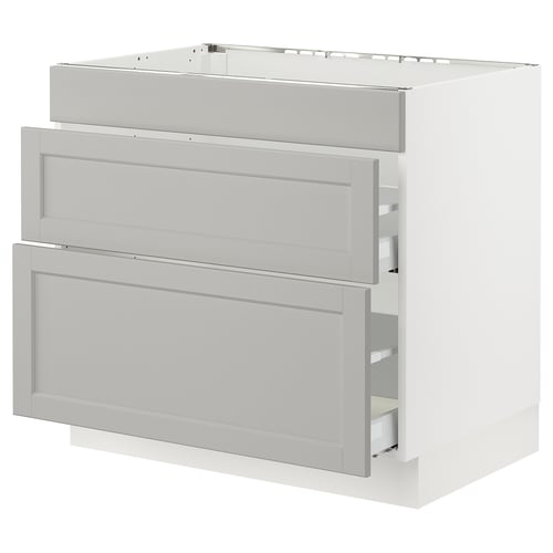White SEKTION kitchen cabinet with light grey lerhyttan fronts and bevelled edges.