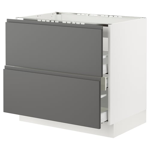 The SEKTION kitchen cabinet with dark grey voxtorp drawers, offering a modern look.