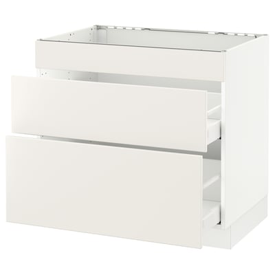 White SEKTION kitchen cabinet with veddinge fronts, sleek design, metal drawer runners.