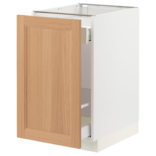 An ikea SEKTION kitchen cabinet with a light oak door and white frame. It has a rectangular shape with a full-extension drawer.