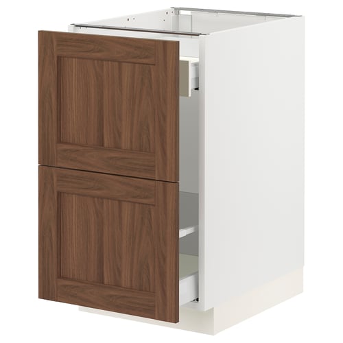 SEKTION kitchen cabinet with walnut-brown wood doors, white base, and soft-close drawers.