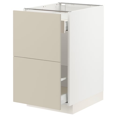 A modern kitchen cabinet named SEKTION with beige havstorp fronts. It a sleek, rectangular design with two full-extension drawers.