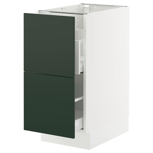 This image the SEKTION kitchen cabinet in dark green with a white frame, displaying a modern and sleek design.