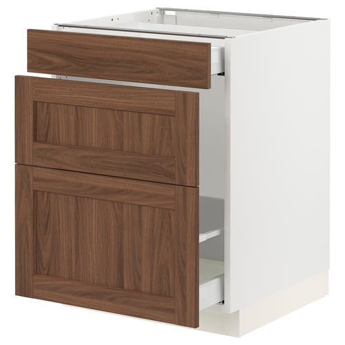 An ikea SEKTION kitchen cabinet with walnut-toned wood grain doors and a white frame. It a pull-out drawer and shelves inside.
