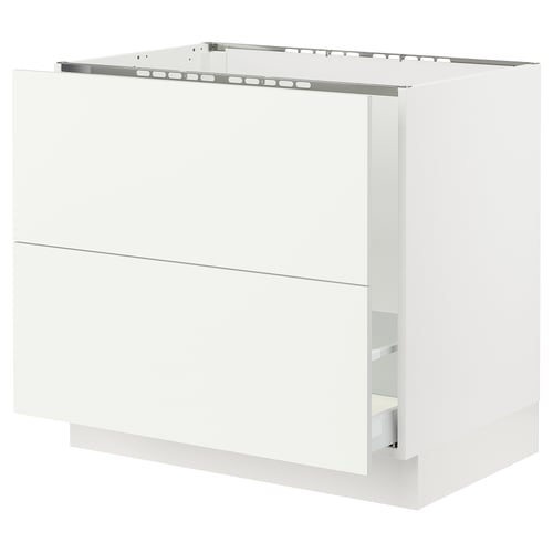 SEKTION white kitchen cabinet with two drawers and metal railings, sleek modern design.