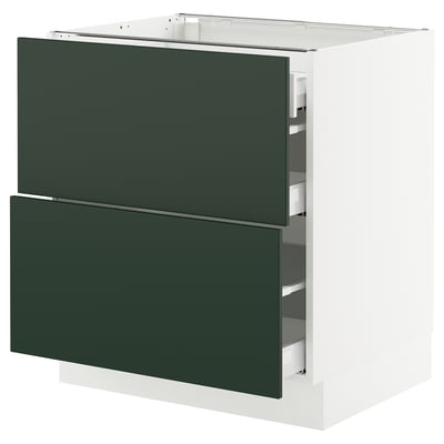 An ikea SEKTION kitchen cabinet in green with two drawers. It a white frame and green drawer fronts. The cabinet is rectangular with a sleek design.