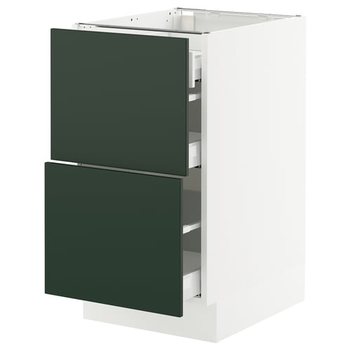 Green kitchen cabinet with drawers