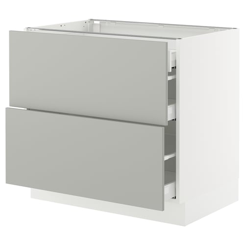 A modern white SEKTION kitchen cabinet with two drawers and a door, featuring a sleek grey finish and a sturdy design.