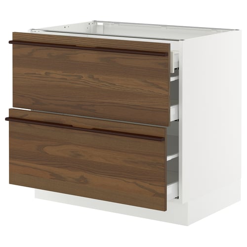 An ikea SEKTION kitchen cabinet with dark brown stained ash veneer drawers and a white base. It full-extension drawers with wooden handles.