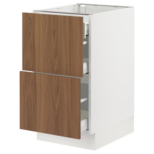 A white and walnut SEKTION kitchen cabinet with drawers. It has a sleek, modern design with a sturdy frame and smooth-running drawers.