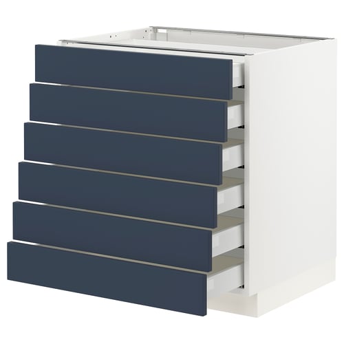 Blue kitchen cabinet with smooth, fully extended drawers. Modern, clean design.