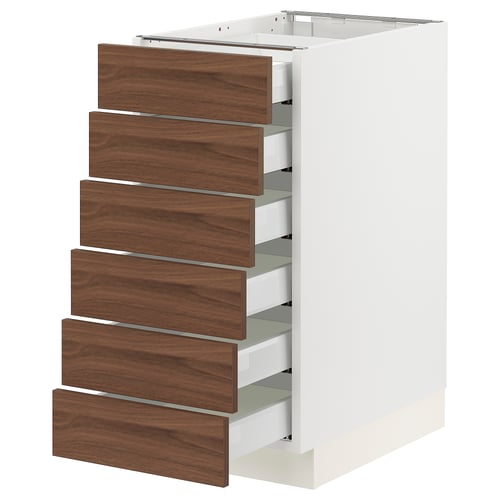 White SEKTION kitchen unit with six walnut wood drawers.