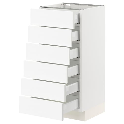 White kitchen drawer unit, six full-extension drawers, sleek modern design.