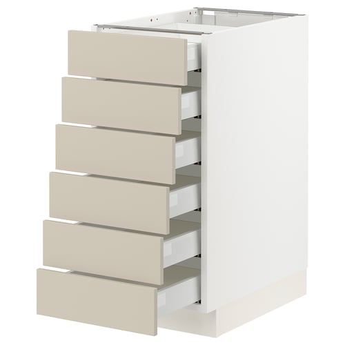 White SEKTION kitchen cabinet with beige drawers, six pull-out drawers, modern minimalist design.