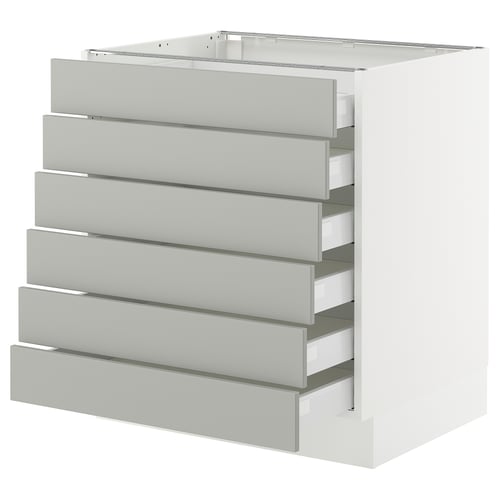 Ikea SEKTION light grey kitchen cabinet with six drawers.