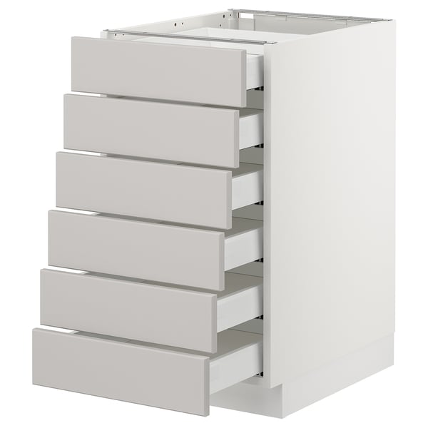 A white SEKTION kitchen cabinet with six grey drawers, each with silver handles. The cabinet is rectangular and has a modern design.
