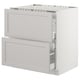 A white SEKTION kitchen cabinet with two opened drawers, displaying a traditional design with solid birch edges.
