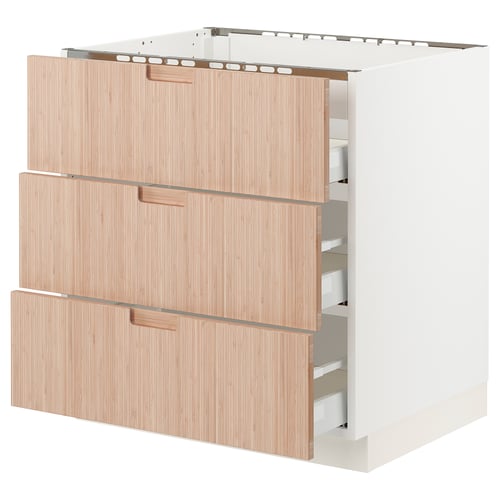An ikea SEKTION kitchen drawer unit with three natural bamboo drawers and a white base. The drawers have wooden handles and are partially open.