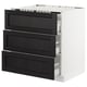 SEKTION white kitchen cabinet with 3 black drawers.