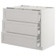 A white SEKTION kitchen cabinet with bevelled edges and multiple drawers. The cabinet is rectangular with a sleek, modern design.