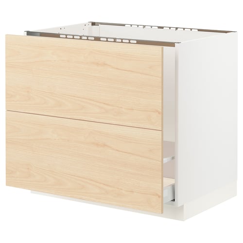An ikea SEKTION light ash wood cabinet with a white frame. It two drawers and a single shelf, providing a natural and vibrant look.