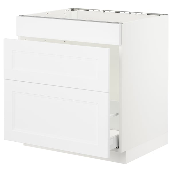 White SEKTION kitchen cabinet, sleek design, three drawer fronts, part of modern kitchen system.