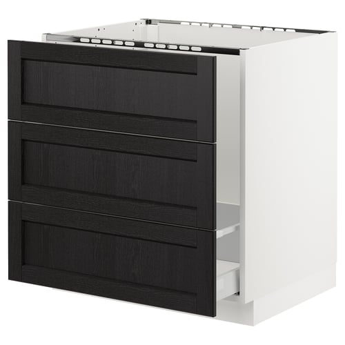 Black stained wood kitchen cabinet with bevelled edges and white frame.