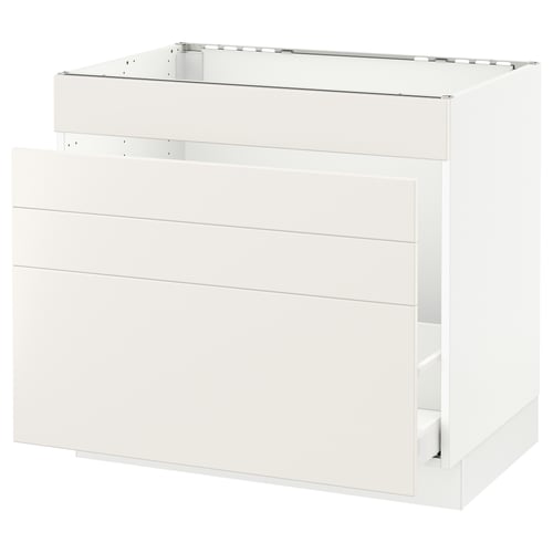 A white ikea SEKTION kitchen cabinet in a minimalist design with smooth surfaces and horizontal lines, featuring a top rail and drawers.