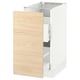 White and wood SEKTION kitchen cabinet with open drawer.
