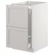Displays a white SEKTION kitchen cabinet with a classic design, featuring two drawers and a door, made from birch and particleboard.