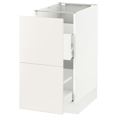A white modern kitchen cabinet from IKEAs SEKTION series, featuring a smooth drawer.