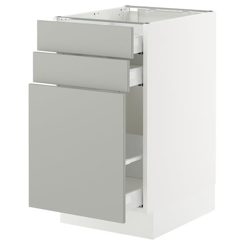 SEKTION kitchen cabinet in light grey with smooth drawers, white base, and clean design.