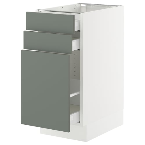 SEKTION kitchen cabinet in grey-green with three drawers and white base.