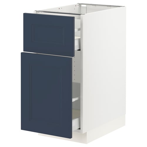 Blue and white kitchen cabinet with drawers and shelves.