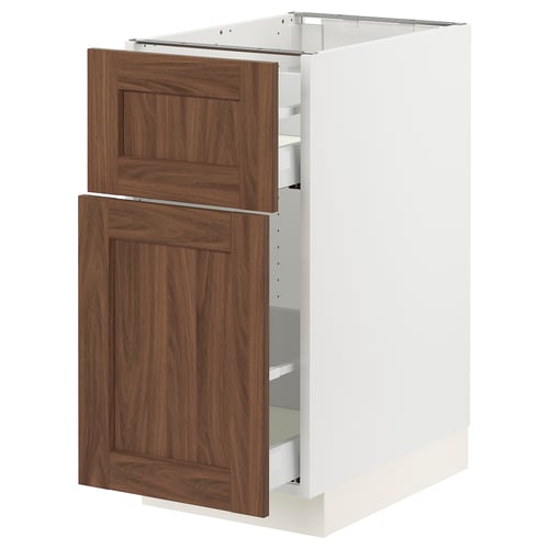 White and wooden kitchen cabinet with drawers.