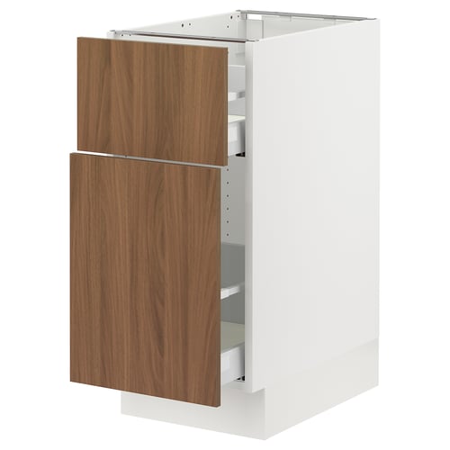 White SEKTION kitchen cabinet with walnut doors and adjustable shelves.