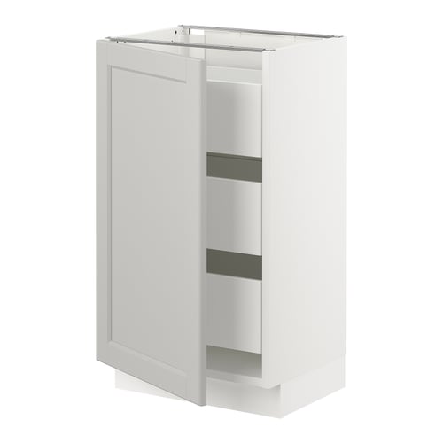White kitchen cabinet with grey shelves and pull-out drawers.