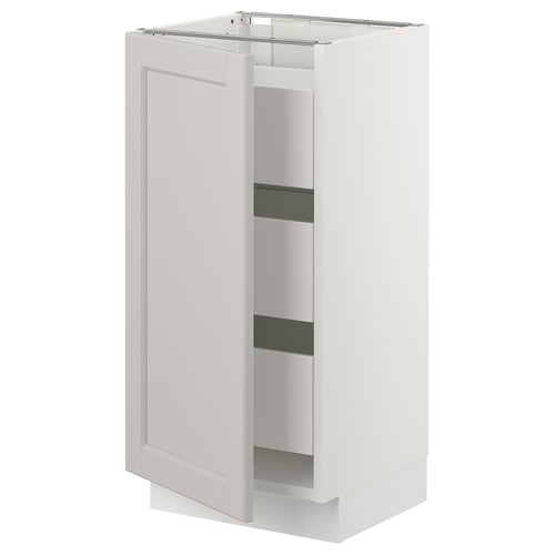 A tall white SEKTION kitchen cabinet with one open door, revealing two shelves.