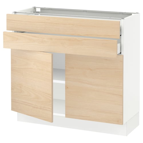 An open light wood-toned kitchen cabinet with adjustable shelves and drawers, part of the SEKTION system.