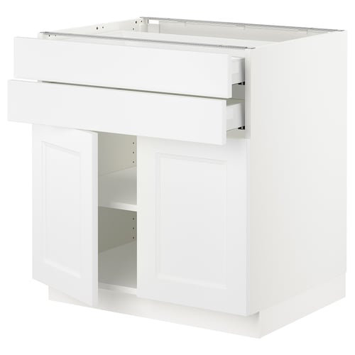 Depicts a white SEKTION kitchen cabinet with a modern design, featuring a drawer and two doors, supported by a sturdy frame.
