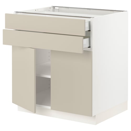 SEKTION kitchen unit in beige with drawers and shelves.