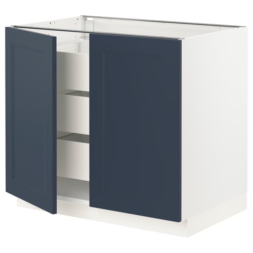SEKTION kitchen cabinet in blue with white base; two doors open, revealing shelves.