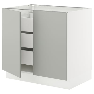 White SEKTION kitchen cabinet, modern design with light grey door.