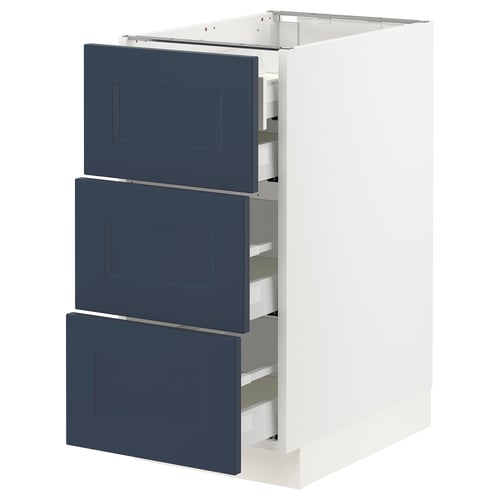 A white SEKTION kitchen cabinet with three blue axstad drawers, each with a rectangular handle and full-extension sliding capability.