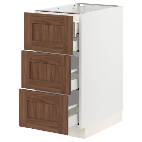 Ikea SEKTION kitchen unit in white with three brown wooden drawers.