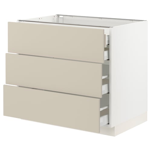 An ikea SEKTION kitchen cabinet with beige havstorp drawers and a white base.