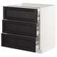 Modern kitchen cabinet with three dark-stained wooden drawers, sleek design, and white frame.