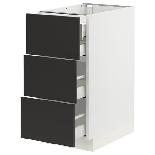 Modern white kitchen cabinet with three black drawers, sleek design.